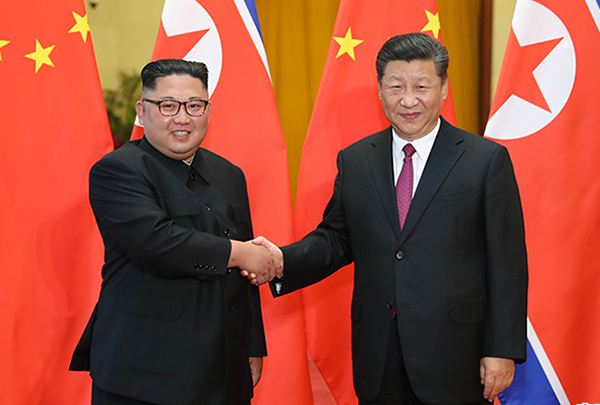 ཞིན་ཅི་ཕིང་དང་ཀེམ་ཇོན་ཨིན་སླར་མཇལ་སྐབས།